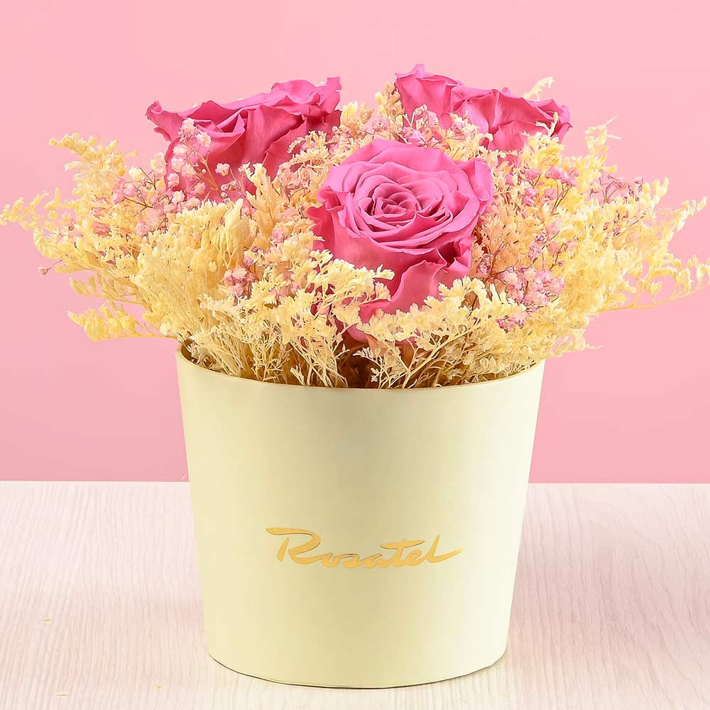 Florería en Lima mini arreglo rosas preservadas violetas Rosatel